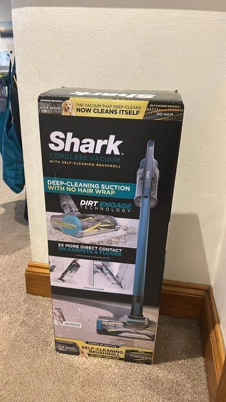 view of our own purchase testing shark cordless vacuum iz102 budget stick vacuum australia unboxing package arrival several weeks to months